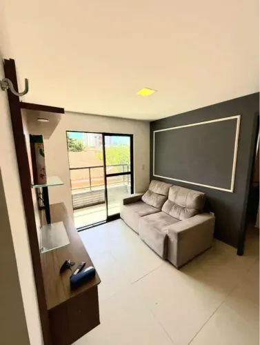Apartamento novo para aluguel, 02 quartos, mobiliado, varanda, elevador perto da praia