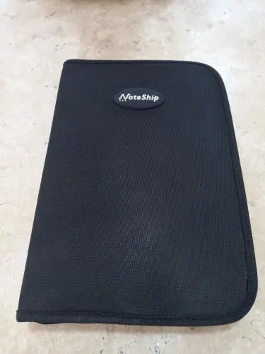 Estojo da noteship. Com fone e calculadora. Retirada em Taubaté.