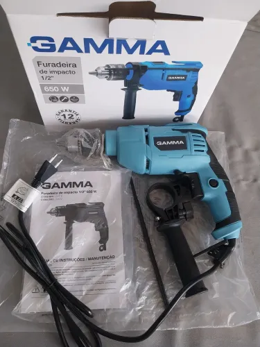 Furadeira e parafusadeira de impacto 127v 650w 13mm marca GAMMA nova sem uso 