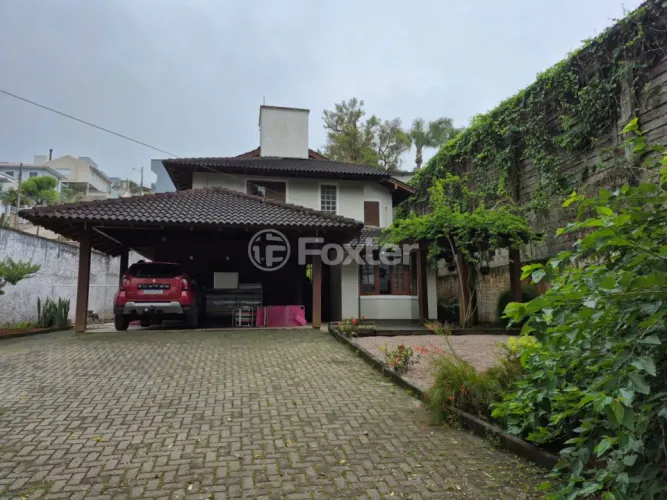 Casa à venda Estrada Haroldo Soares Glavan, Cacupé - Florianópolis