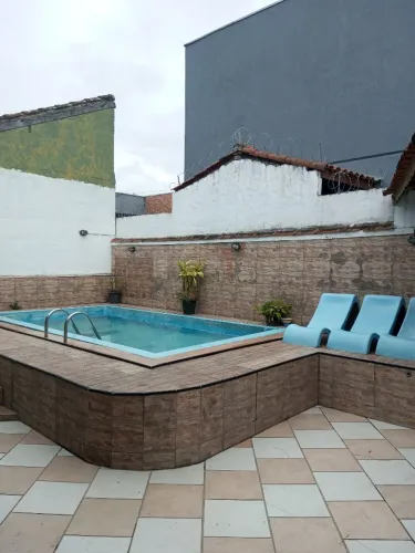 Com piscina ao do Serramar shopping 10 minutos do centro