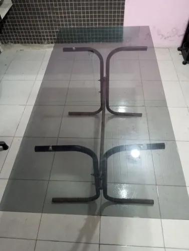 Mesa vidro grande de 250 reais por 299, reais.