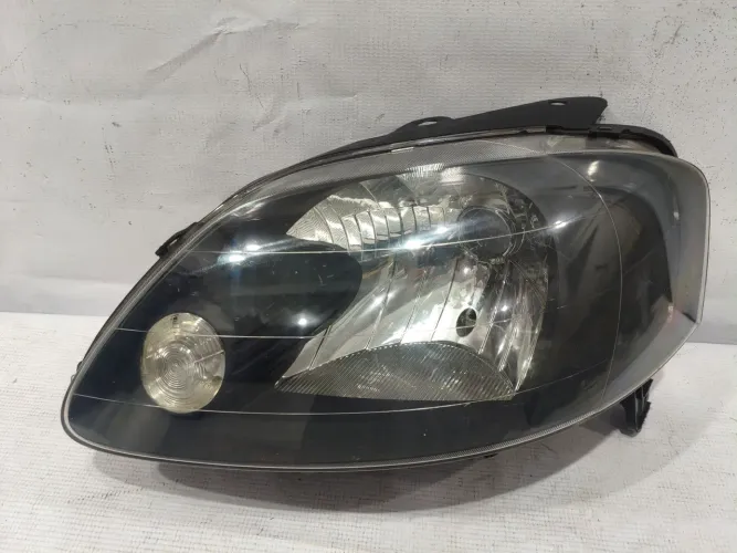 Farol Esquerdo Fox 2004 a 2009 Máscara Negra Original 