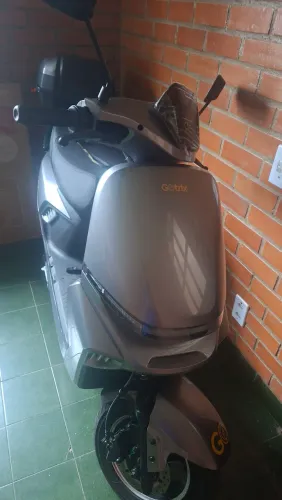 Motinha/ com baú