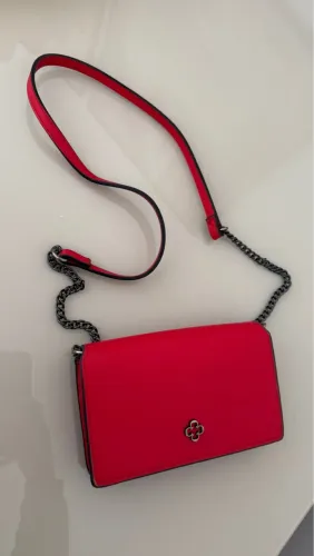 Bolsa capodarte e lança perfume 