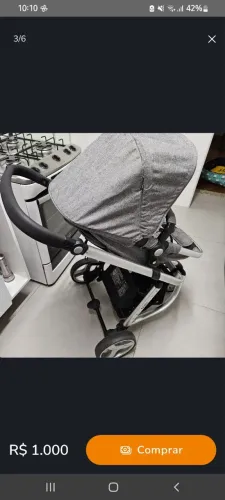 Carrinho com bebê conforto e base