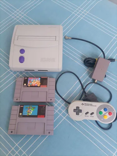 Super Nintendo com 3 jogos.
