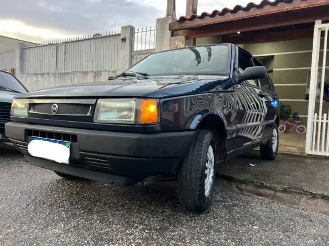 Uno Mille 1.0 Fire Economy 4 Portas 2004  Cor Exclusiva Azul Marinho 