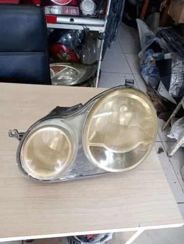 Farol esquerdo Polo 2003 até 2006 usado original