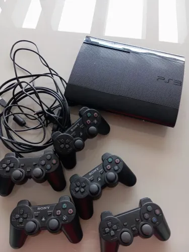 Play station 3 Super Slim + 15 jogos