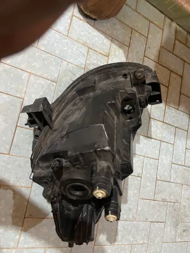 Farol original nissan smarch