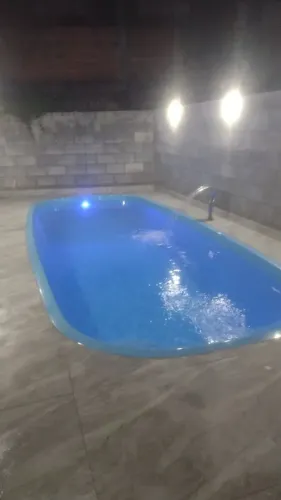 CASA COM PISCINA CARAGUA