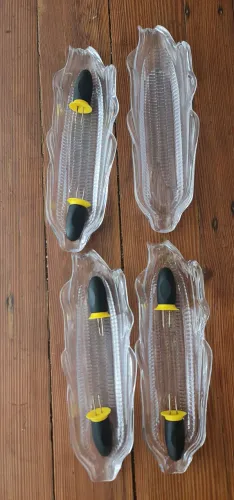 Conjunto de suporte para milho cozido
