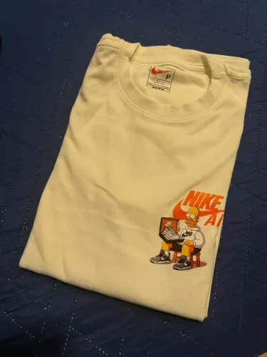 Camisa over da Nike e Novestarss