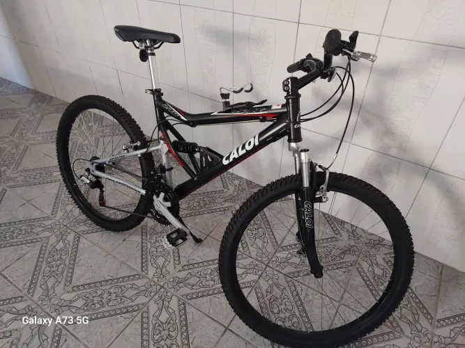 Bicicleta da caloi aro 26 , alumínio  ,  amortecedor  duplo  , 21 marcha  !