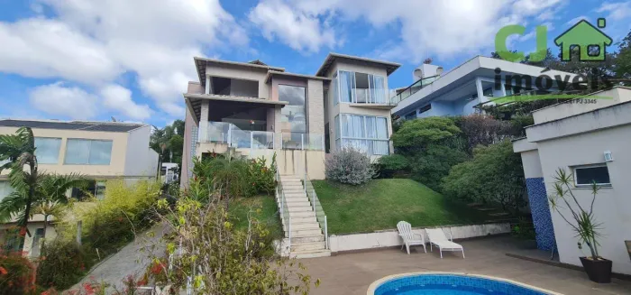 Casa com 3 dormitórios à venda, 550 m² por R$ 3.770.000,00 - Condomínio Vivendas - Lagoa S