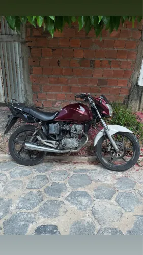 Vendo mix 150, documentada com débito de 1k, moto toda filé