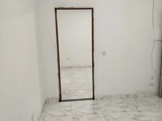 Alugar se uma quitinete espaço sala e cozinha junto e um quarto suite