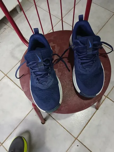 Tenis Nike MC Trainer 3 masculino tamanho 40 azul e laranja.