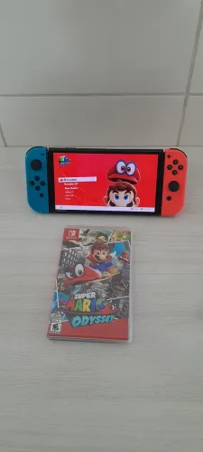 Nintendo Switch OLED + Super Mario Odyssey (Físico)-Completo