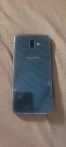 Vendo j6+ ou troco em uma bicicleta aro 26/29