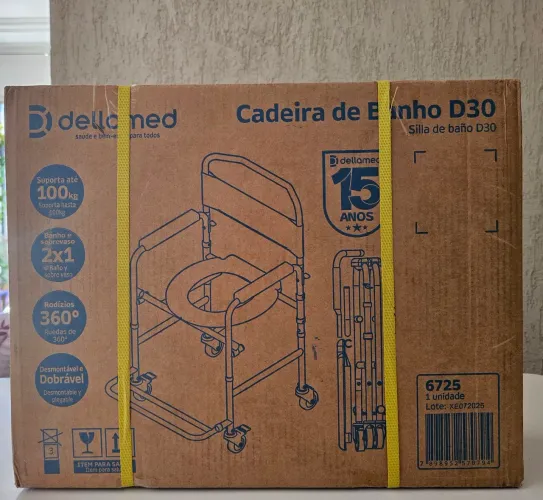 Cadeira de banho higiênica na caixa sem uso