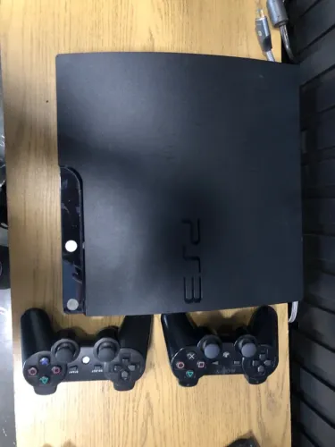 PS3 Slim - HEIN 500gb 11 jogos na memória e 2 controles