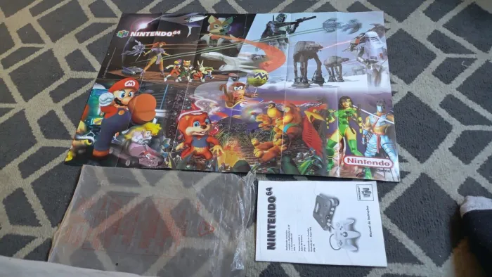 Manuais e poster Nintendo 64 original e manual da Sony <br>$300+frete