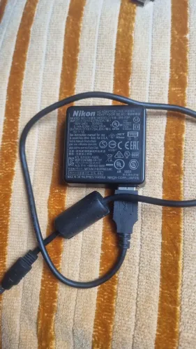Fonte(carregador) para câmera Nikon modelo EH-73P com cabo