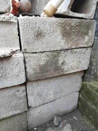 Doação de pó de pedra e bloco de 20