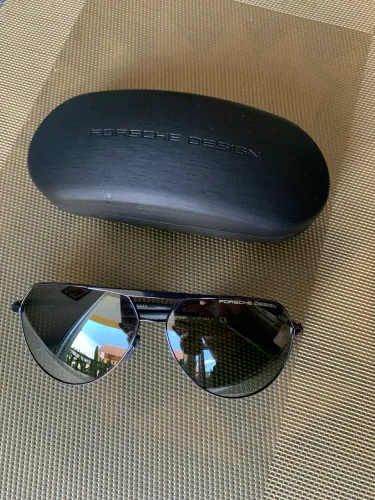 Óculos porsche desing semi novo, preço novo (1900rs) aceito iPhone 11/12