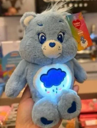 Ursinho carinhoso pelúcia Azul cacau show páscoa 2026