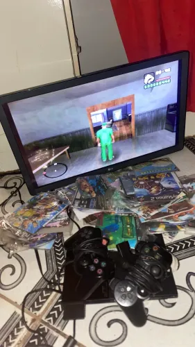 PlayStation 2 +50 jogos + 2 controles