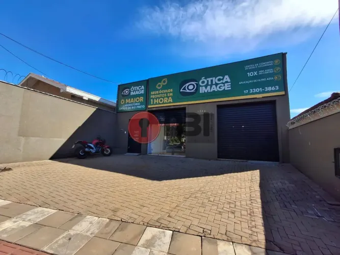 Imóvel comercial para locação-salas-amplo espaço-cozinha-estacionamento-alarme