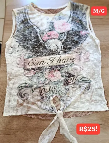 Blusa rendanda nas costas conservada