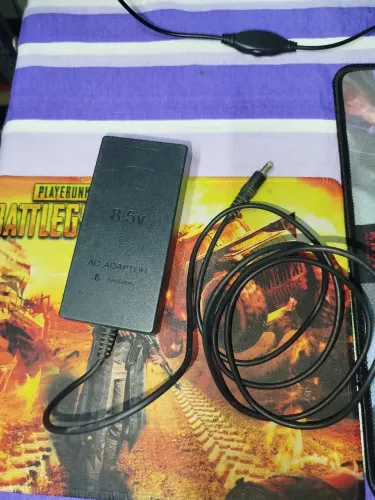 Fonte de PS2 uma original e outra não