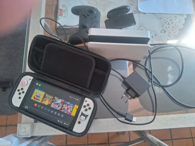 Nintendo switch oled + controle pro + case + película