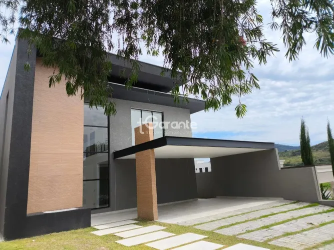 Casa em Atibaia alto padrão, condomínio fechado, 4 suítes, piscina, área gourmet, ampla ár