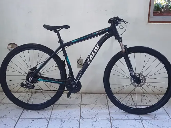 BICICLETA CALOI EXPLORER ARO 29 QUADRO 19 KIT SHIMANO FREIO HIDRÁULICO 