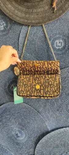 Bolsa monogram Victor Hugo pequena alça transversal 