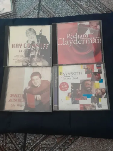 4 CDs Originais Clássicos e Instrumental - Pavarotti, Clayderman, Ray Conniff, Paul Anka
