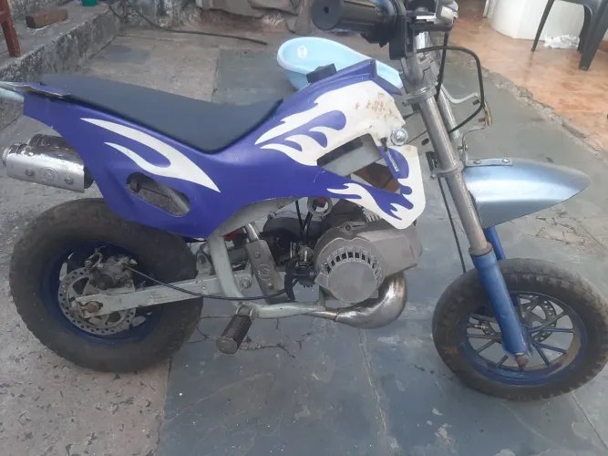 Vendo mini moto 49 cc funcionando falta alguns reparos de estetica