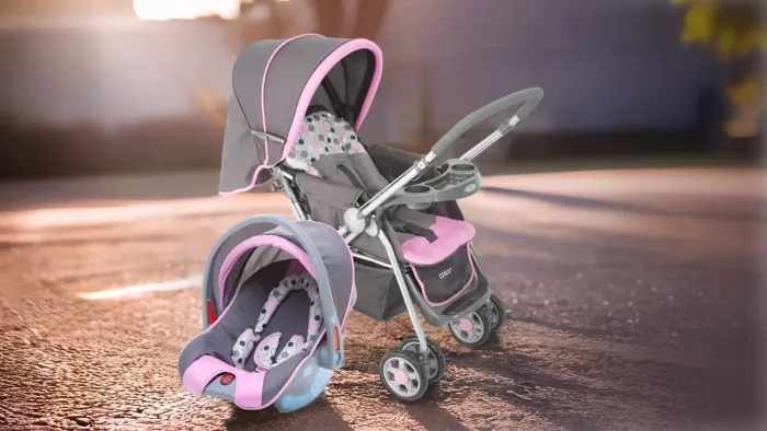Carrinho e bebê conforto rosa Cosco