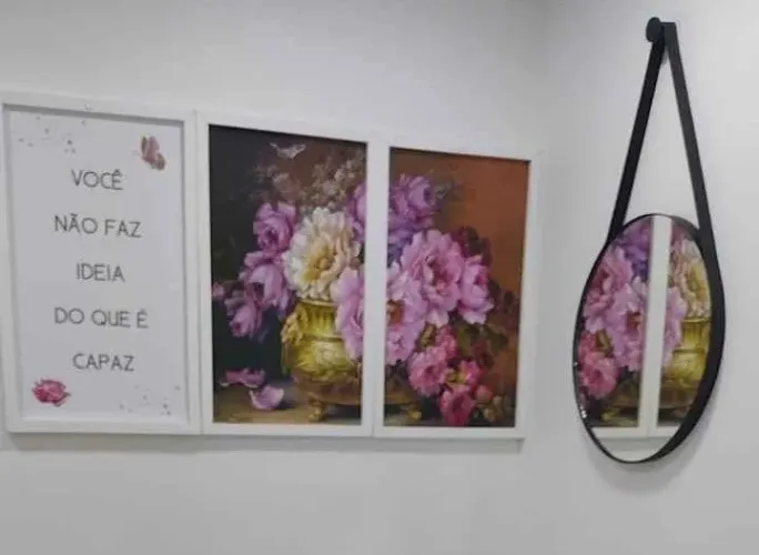 Espelho redondo + quadro grande