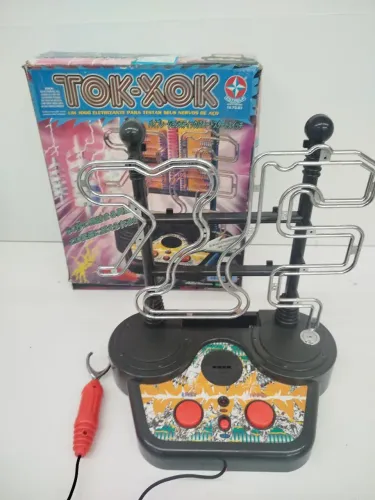 Brinquedo antigo tok-xok da estrela