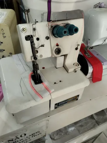 Máquina de costura Galoneira bracob semi nova estado de zero revisada com garantia  
