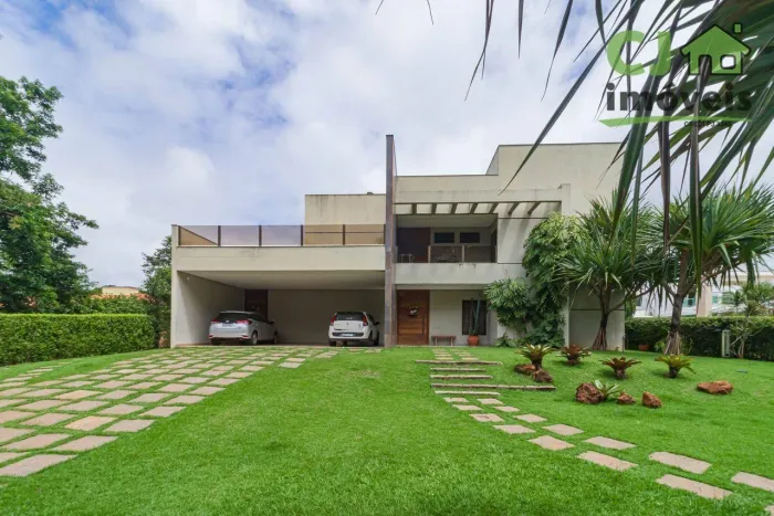 Casa com 5 dormitórios à venda, 443 m² por R$ 2.990.000,00 - Condomínio Moradas dos Pássar