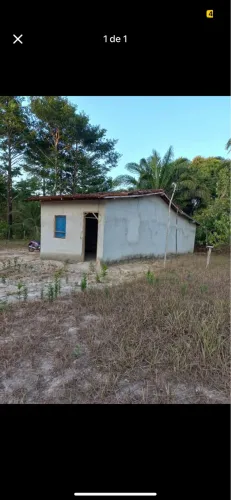Terreno com casa construída