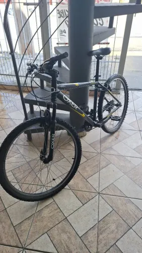 Bicicleta aro 26 Oxer Shimano com transbike simples