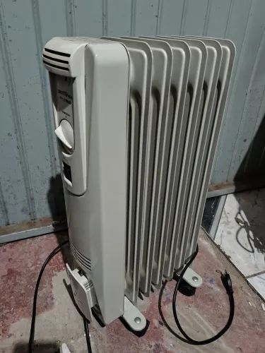 Com entrega aquecedor a oléo